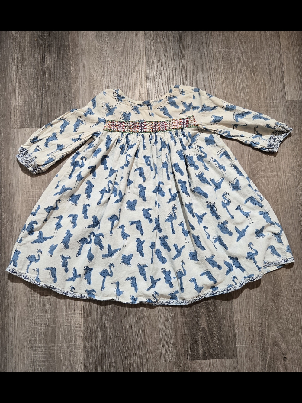 fabindia Cream Dress with Blue Bird Print and Smocked Yoke